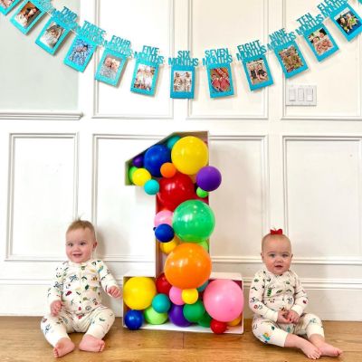 Maisy Joanne Stocklin and her twin brother, Wesley Koy Stocklin celebriting their first birthday. 